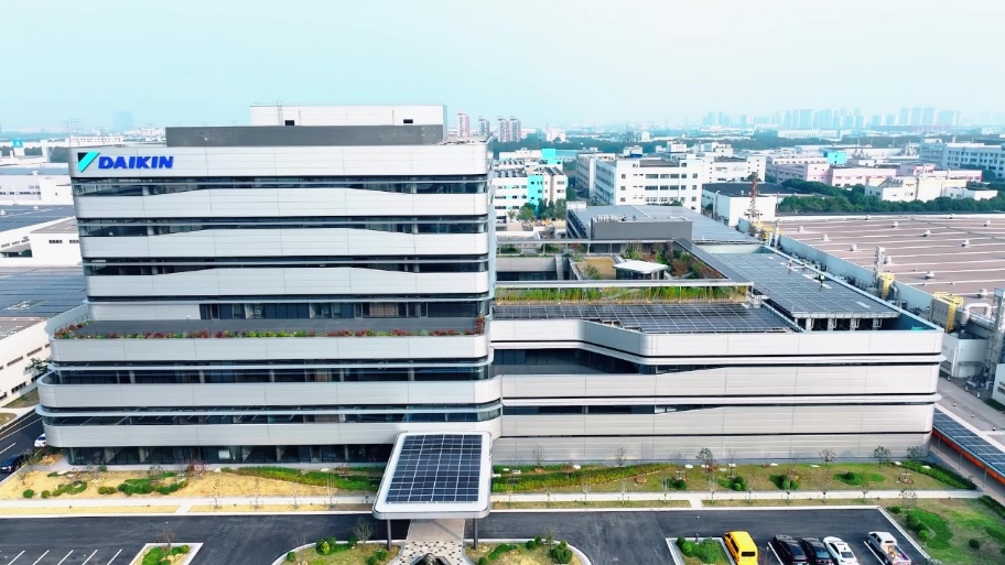 D:工作�5年苏州研发落成-媒体交流会微信图文稿件照片 - to代总大楼航拍照片.jpg